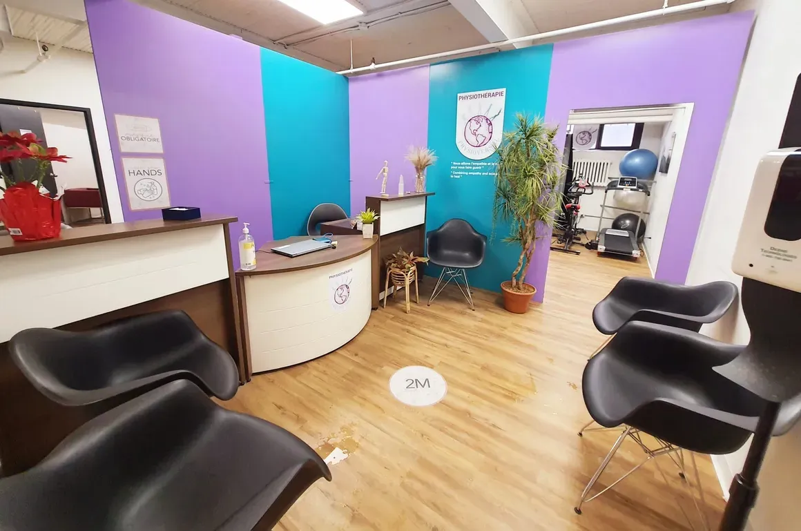 Physioversal clinic reception with purple and turquoise walls
